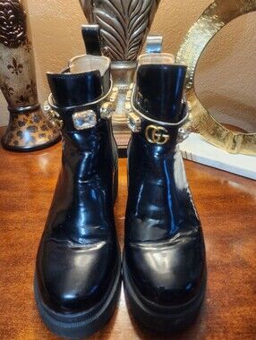 Authentic Gucci Black Patent Leather Ankle Boots with CalfSkin Jeweled GG Strap